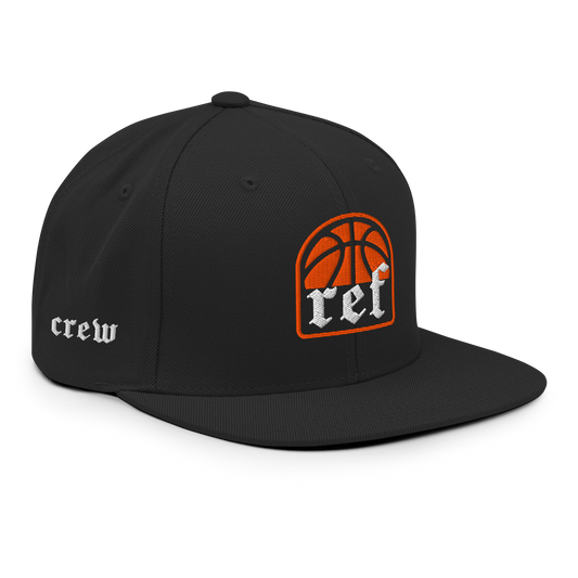 Black Ref' Crew referee snapback cap with RC basketball badge — right three-quarter view