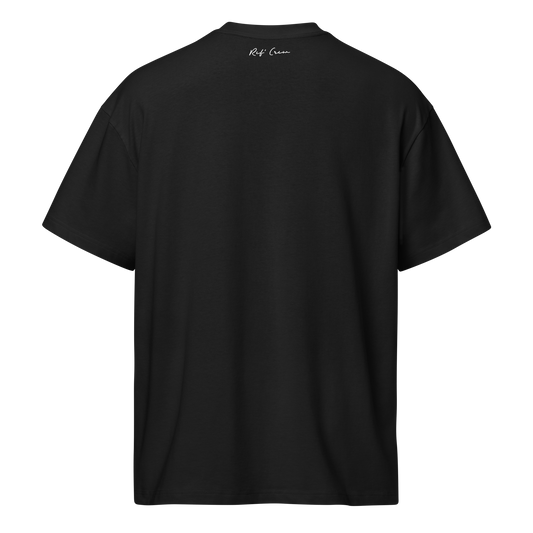 Black oversized cotton referee t-shirt for basketball officials, featuring a small white "Ref' Crew" signature on the back.