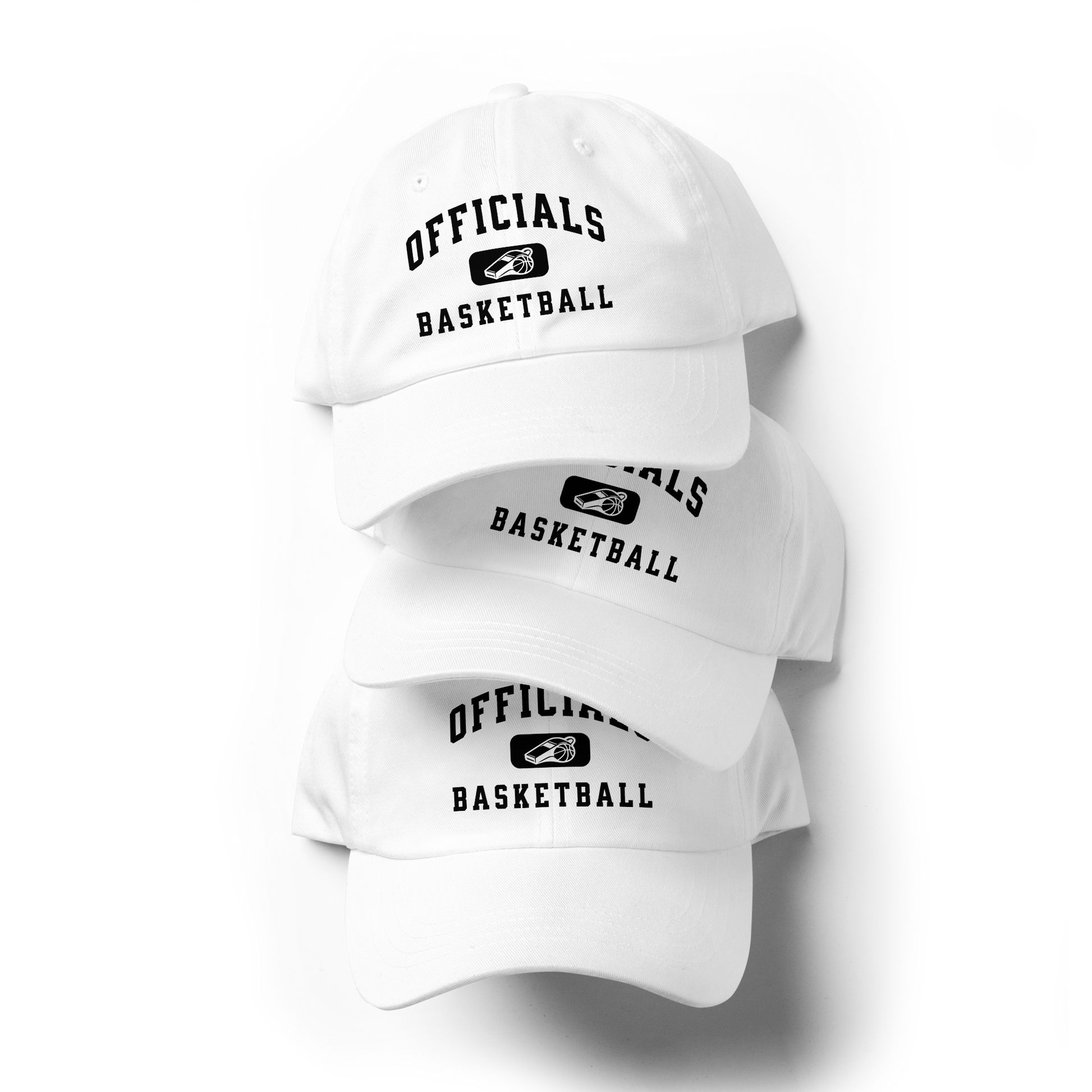 White Yupoong dad caps stacked, featuring "OFFICIALS BASKETBALL" text and whistle/basketball logo.