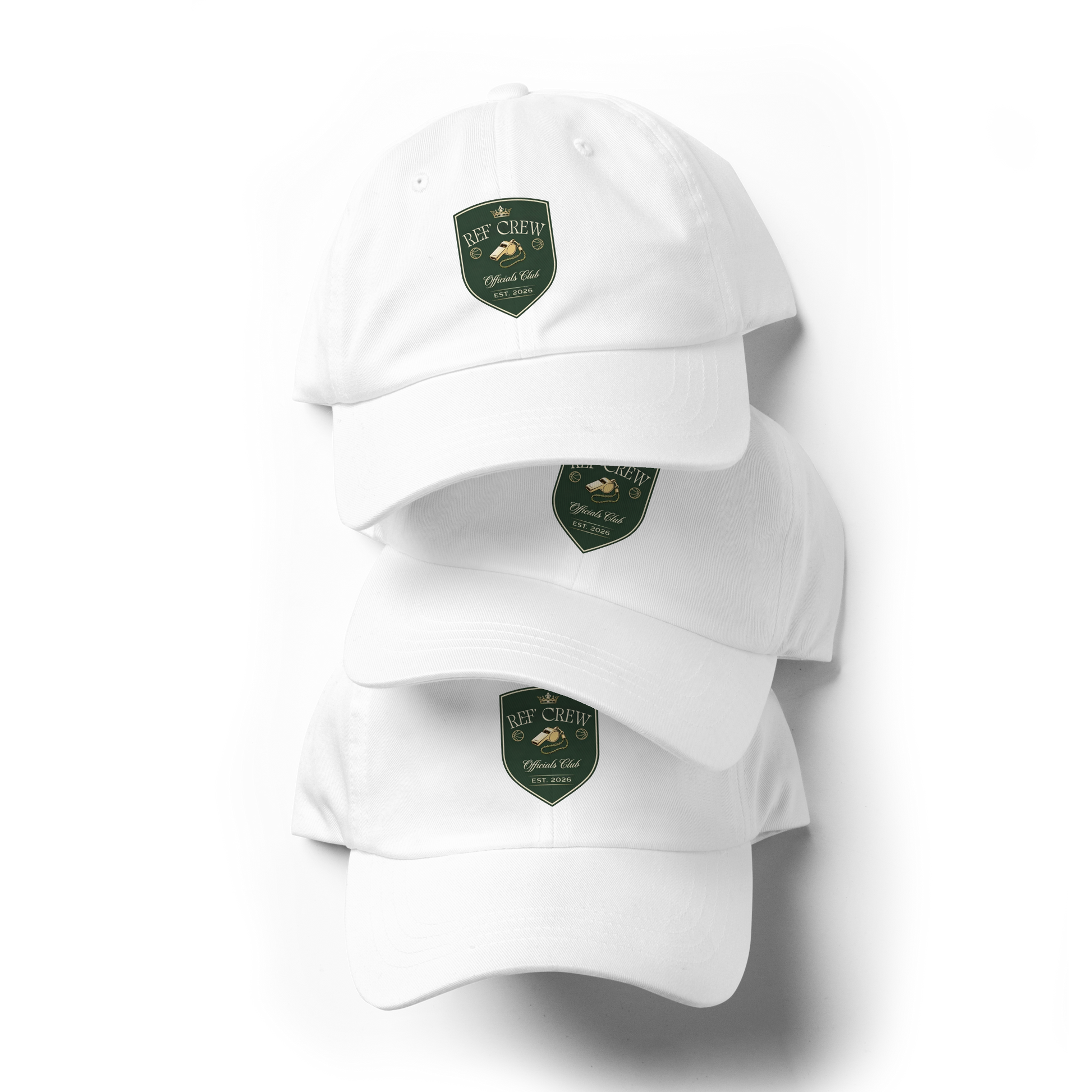 White Yupoong dad caps with a vintage Ref' Crew Officials Club shield logo, perfect for basketball referees.