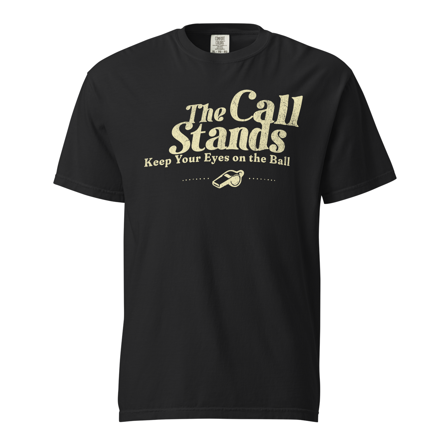 Black "The Call Stands" tee with distressed cream text, whistle graphic, and premium heavyweight cotton for referees.