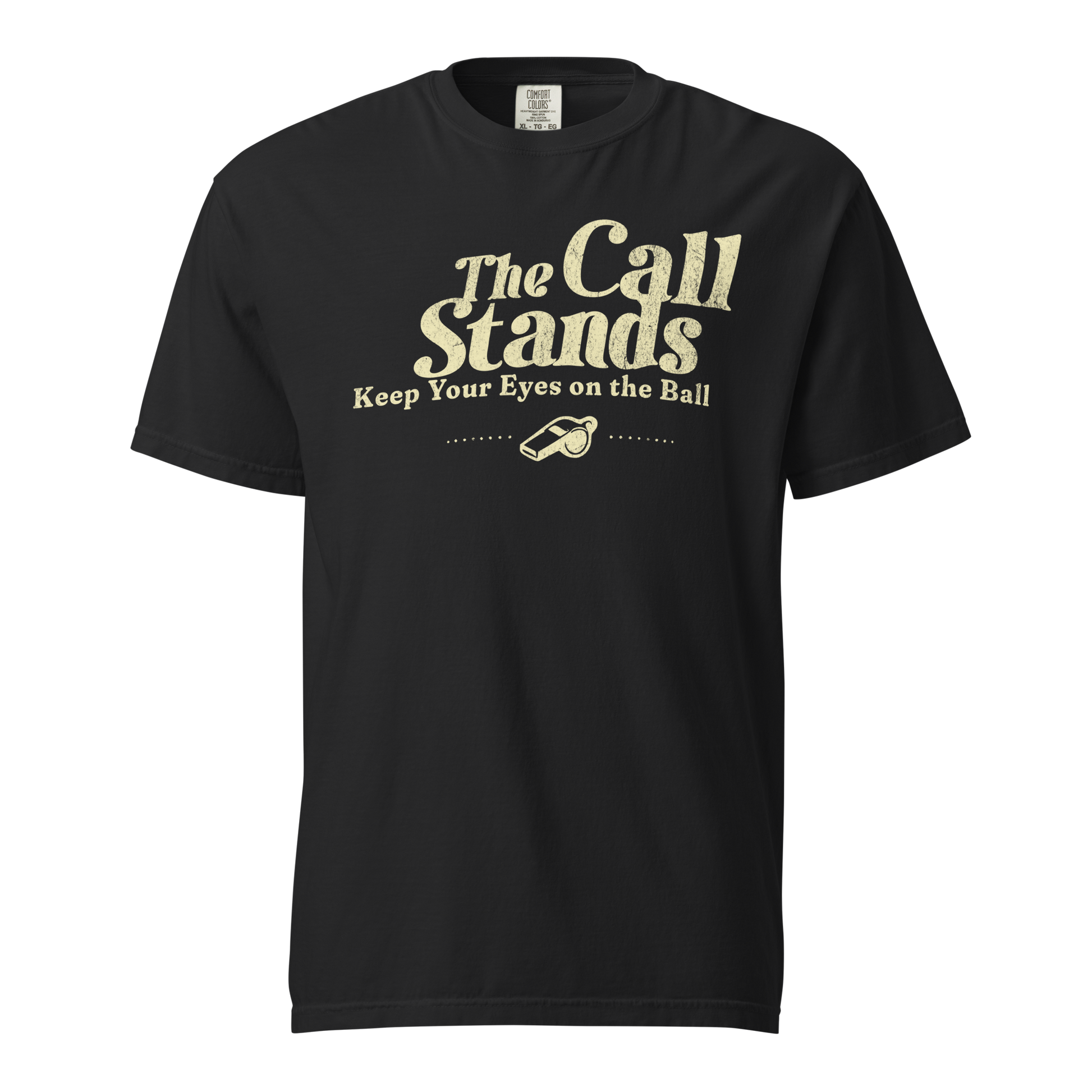 Black "The Call Stands" tee with distressed cream text, whistle graphic, and premium heavyweight cotton for referees.