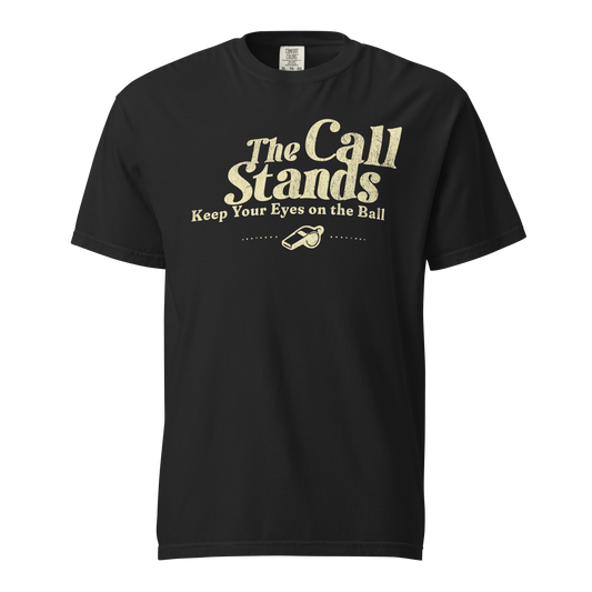 Black "The Call Stands" tee with distressed cream text, whistle graphic, and premium heavyweight cotton for referees.