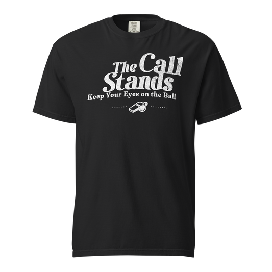 Black heavyweight cotton "The Call Stands" referee tee with distressed white text and whistle graphic.