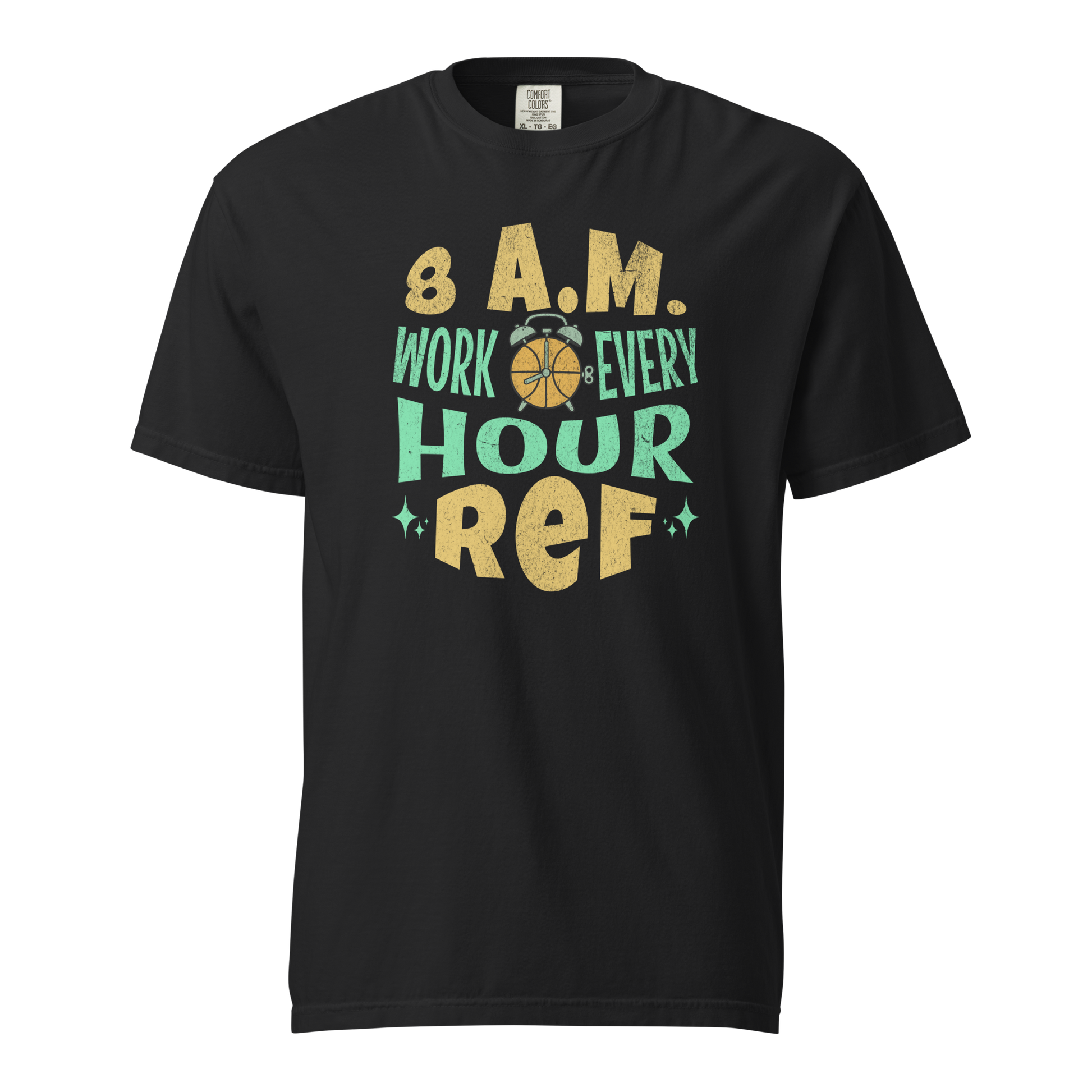 Black garment-dyed heavyweight tee, front view — hand-lettered retro 8 A.M. WORK EVERY HOUR design in mustard gold and mint green around a basketball alarm-clock icon