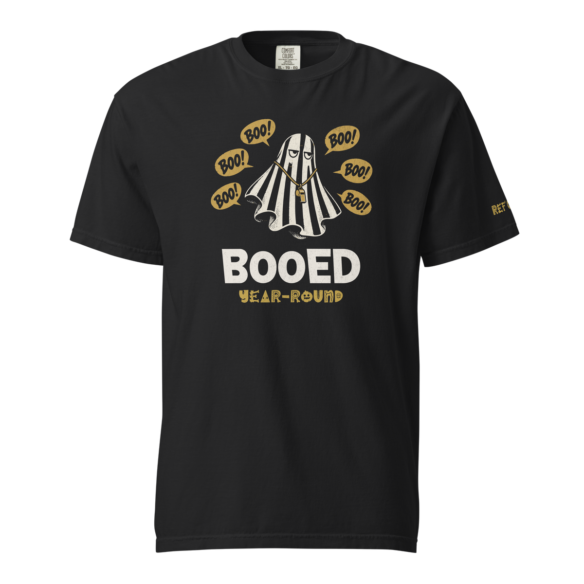 Booed Year-Round Tee in black – front view, deadpan ghost in referee stripes with a gold whistle, surrounded by gold "BOO!" bubbles – Ref' Crew basketball referee Halloween tee