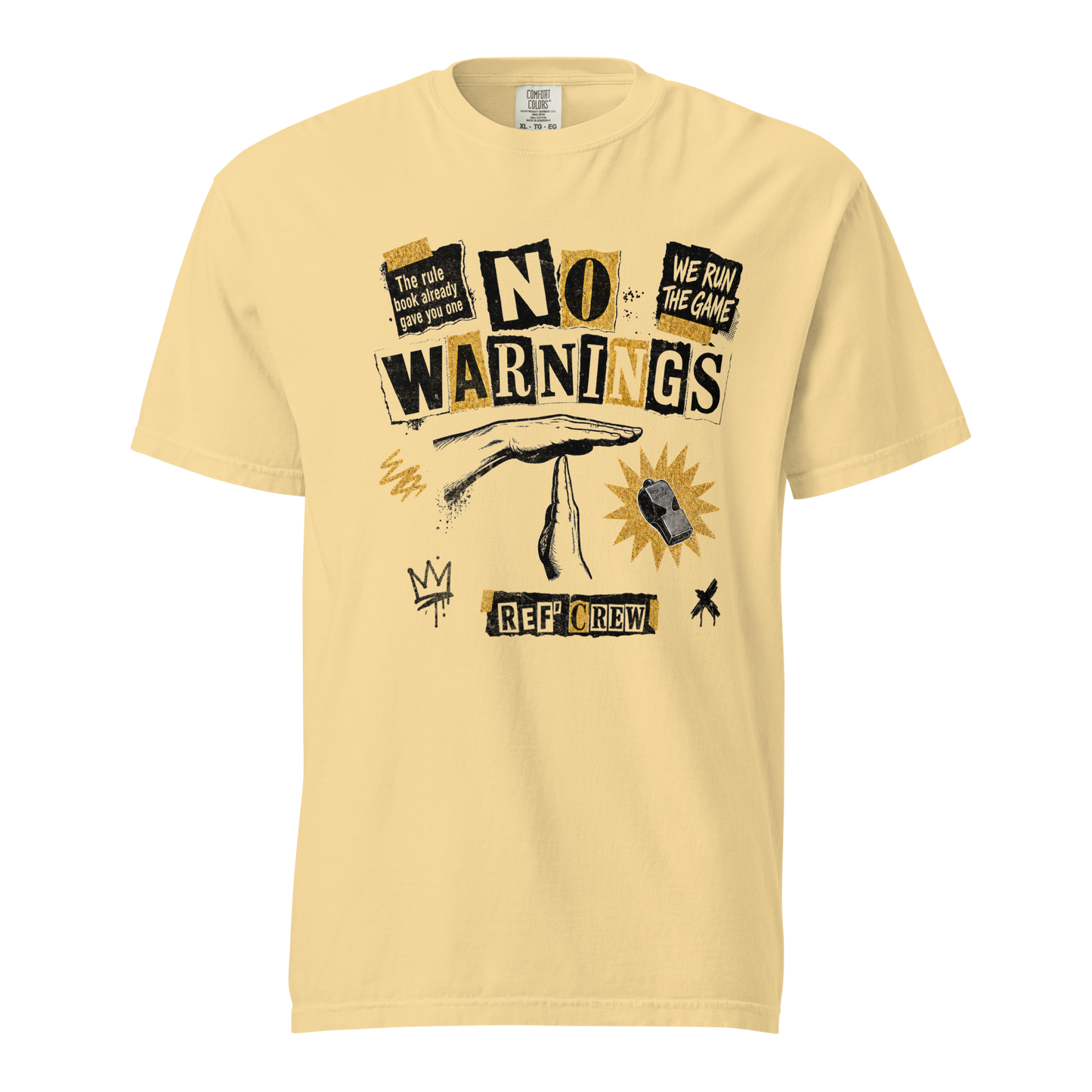 The No Warnings Tee in Butter — front view. NO WARNINGS ransom-note collage with the referee technical "T" signal and Fox 40 whistle.