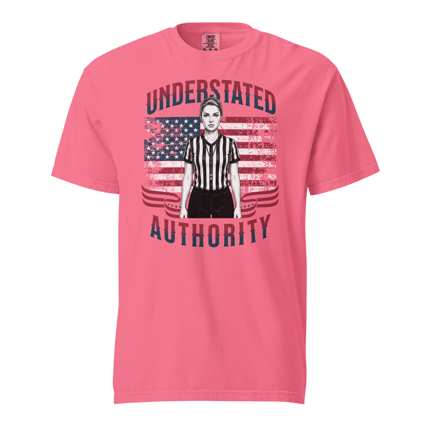 Pink Comfort Colors tee with "Understated Authority" graphic of a female referee and US flag.