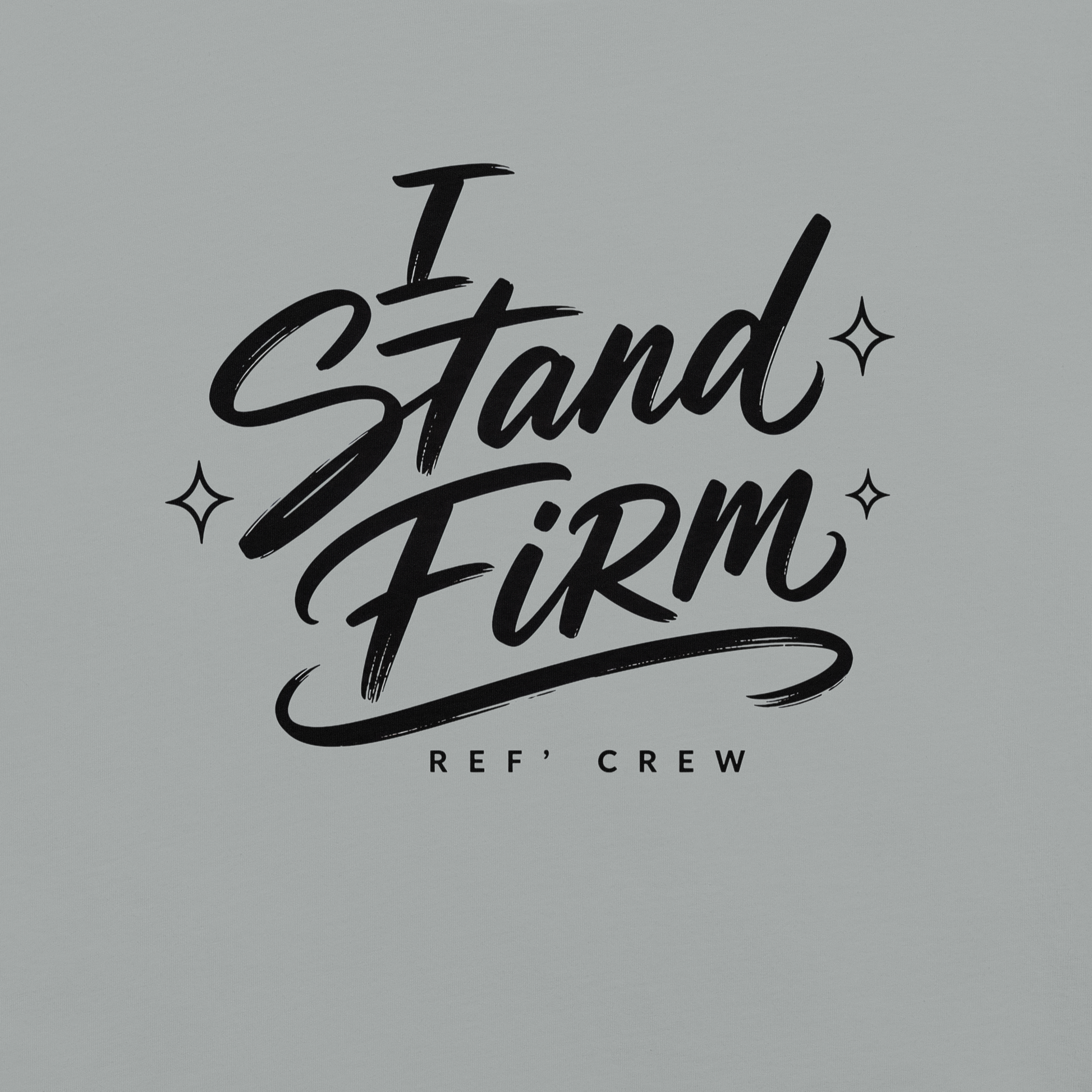Close-up of the black "I Stand Firm" brush lettering and Ref' Crew signature on Granite garment-dyed cotton
