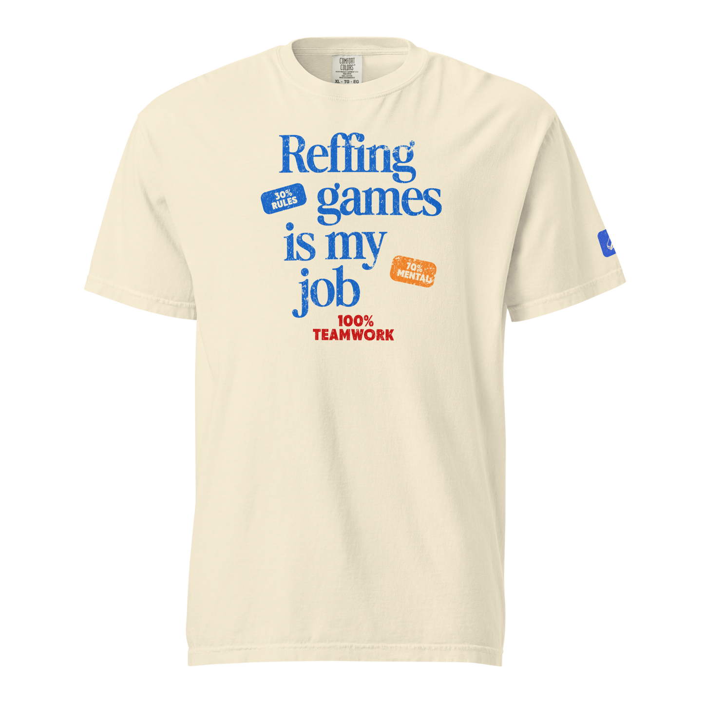 Cream "Manifesto" performance tee with "Reffing games is my job" text, blue whistle icon, and streetwear style.