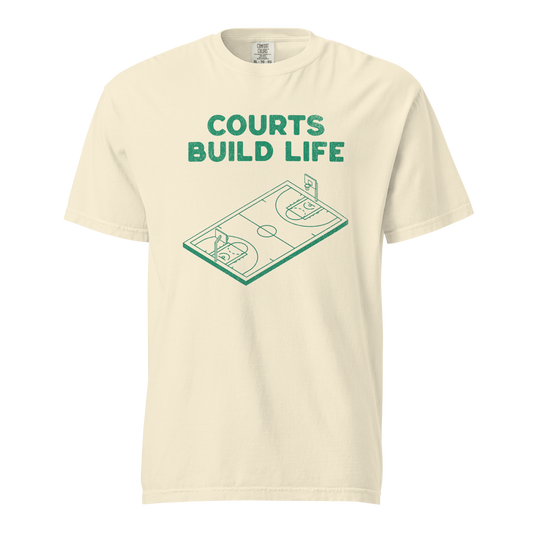 Ivory garment-dyed heavyweight tee, front view — forest green isometric line drawing of a full basketball court under bold stacked Courts Build Life lettering