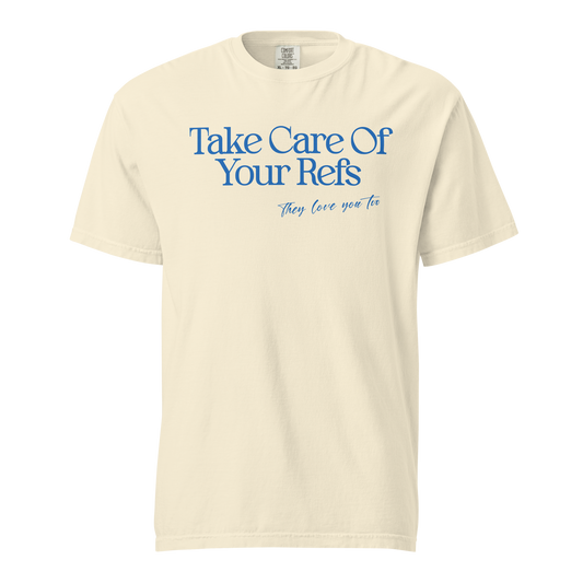 Ivory garment-dyed heavyweight tee, front view — Take Care Of Your Refs in bright blue serif lettering with a hand-scripted line underneath