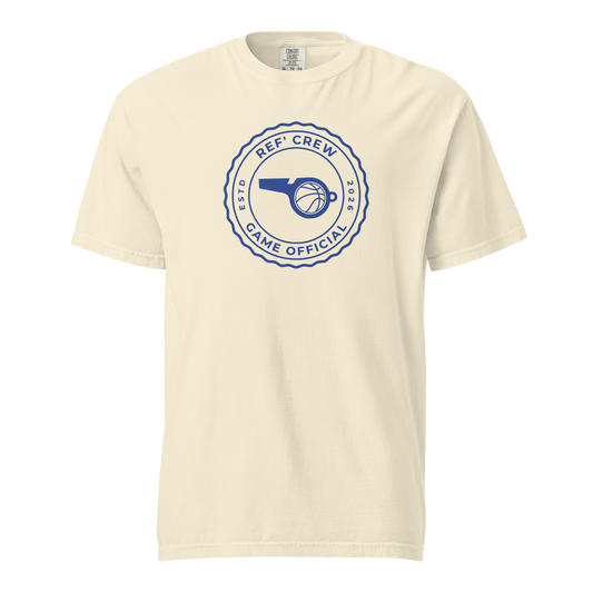 Ivory garment-dyed heavyweight tee, front view — royal blue circular Ref' Crew Game Official seal with whistle, basketball and ESTD 2026