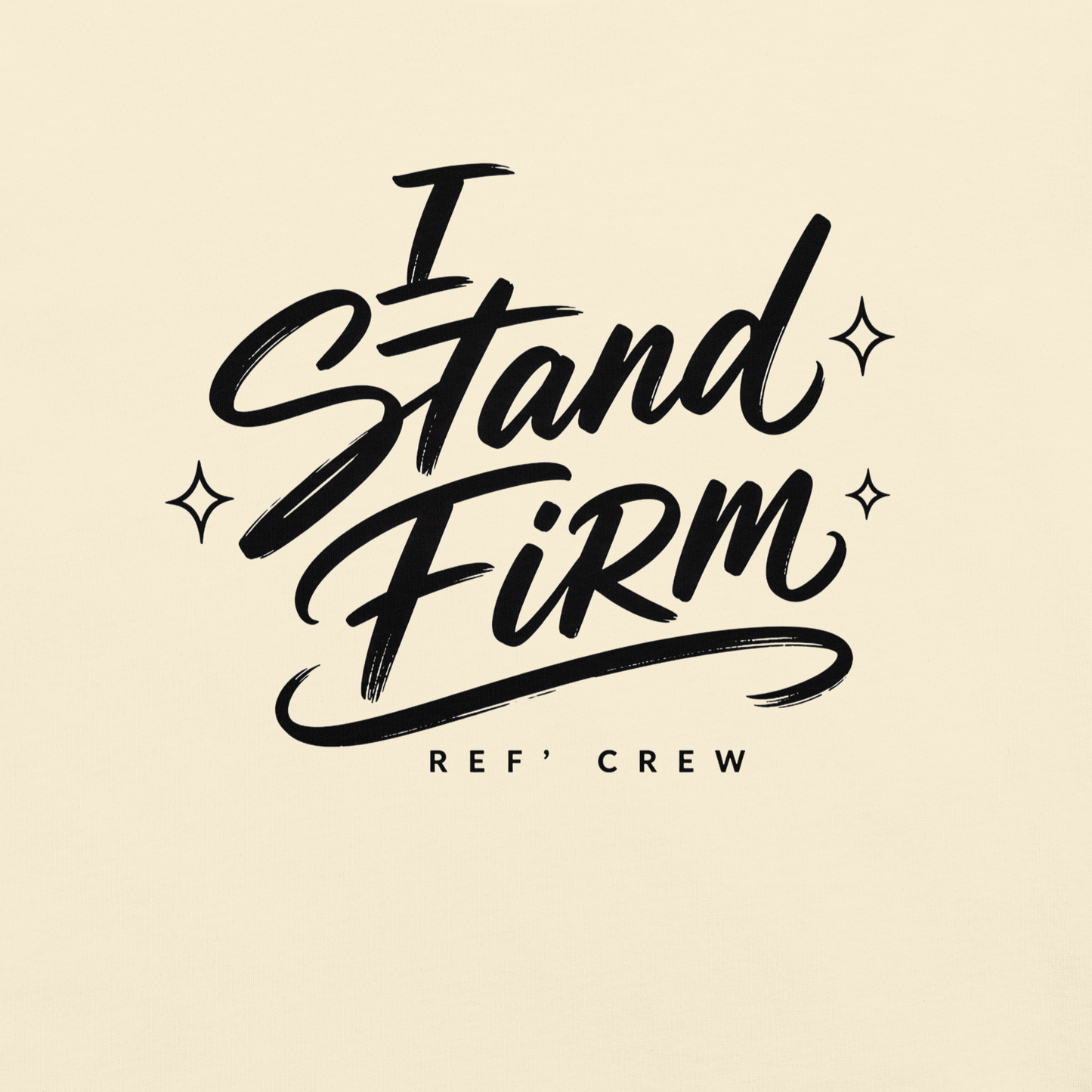 Close-up of the black "I Stand Firm" brush lettering and Ref' Crew signature on Ivory garment-dyed cotton