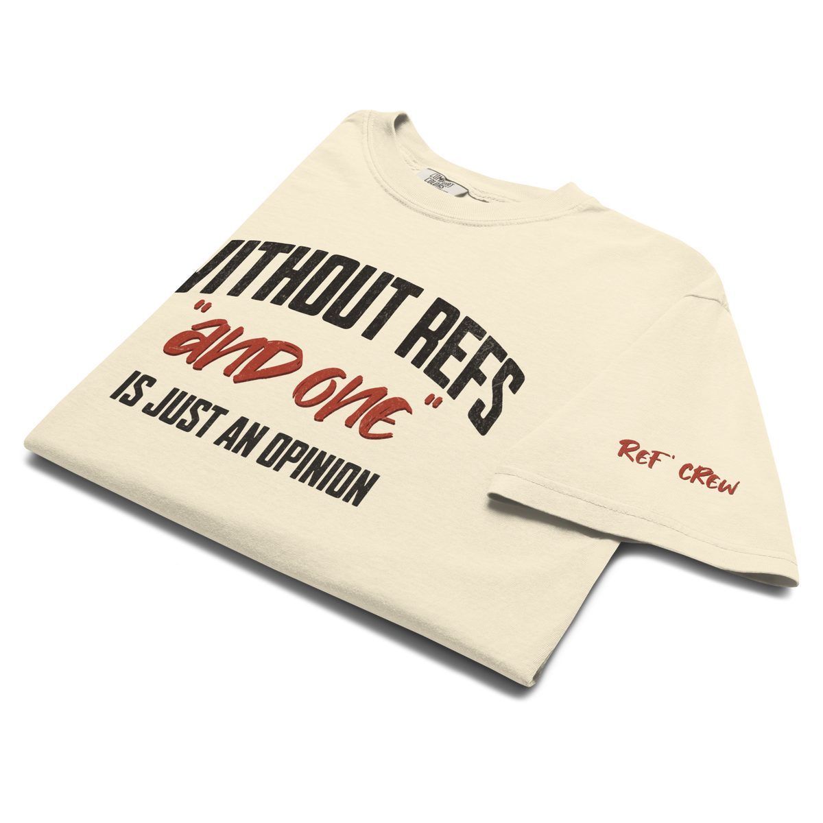 The And One Tee folded, showing the chest print and the oxblood Ref' Crew wordmark on the sleeve