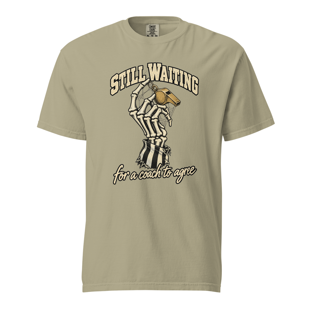 Still Waiting Tee in Khaki – front view, skeleton hand holding a cobwebbed gold whistle under "STILL WAITING" – Ref' Crew basketball referee Halloween tee