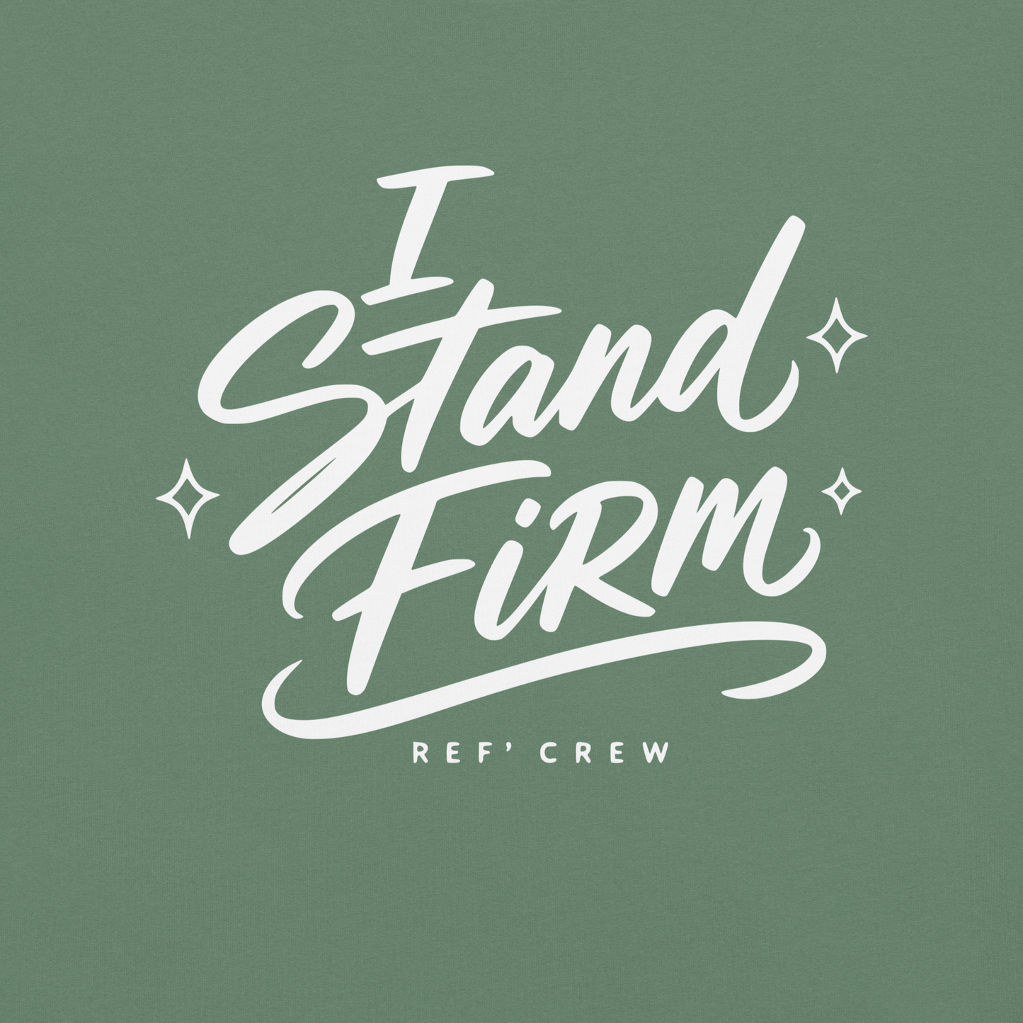 Close-up of the white "I Stand Firm" brush lettering and Ref' Crew signature on Light Green garment-dyed cotton