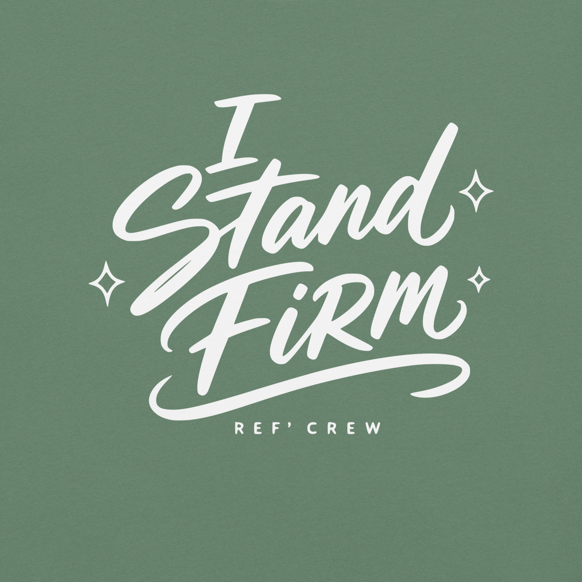 Close-up of the white "I Stand Firm" brush lettering and Ref' Crew signature on Light Green garment-dyed cotton