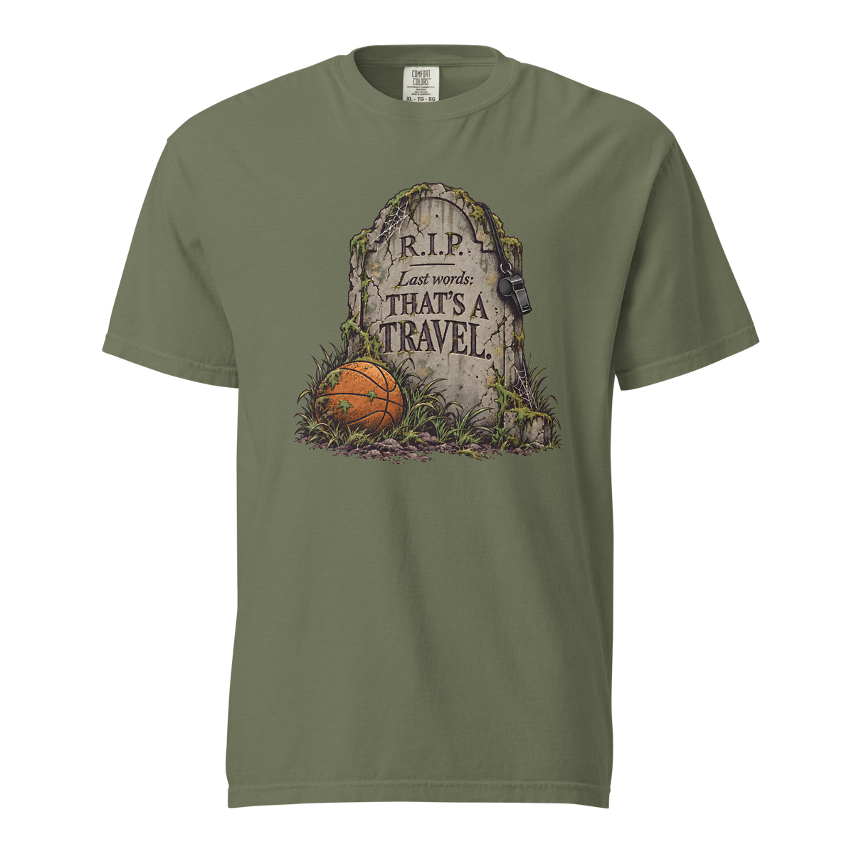 That's a Travel Tee in Moss – front view, mossy tombstone engraved "R.I.P. Last words: THAT'S A TRAVEL." with a hanging whistle and a basketball in the grass – Ref' Crew basketball referee Halloween tee