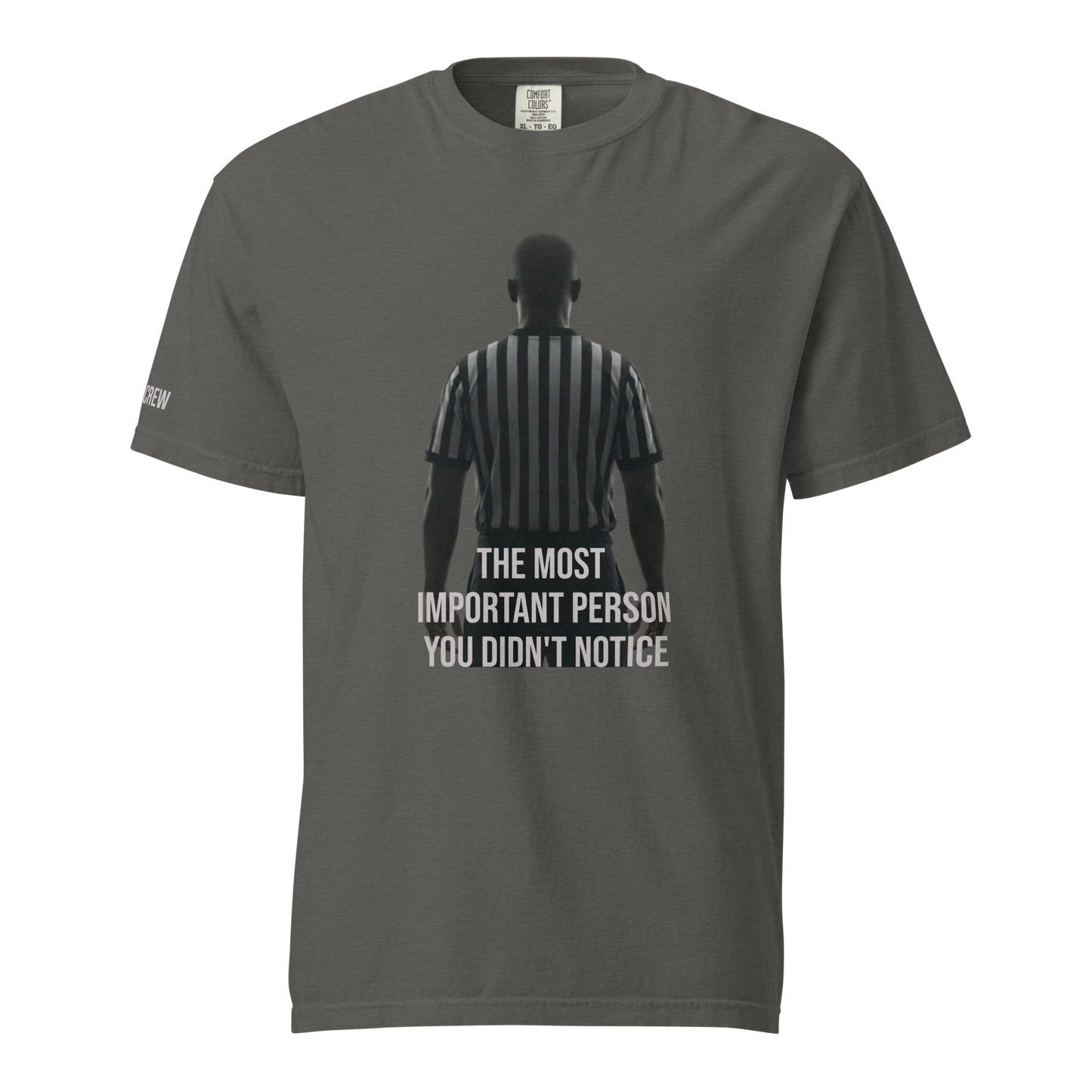 Charcoal Comfort Colors tee with a powerful referee graphic and "THE MOST IMPORTANT PERSON YOU DIDN'T NOTICE" text.