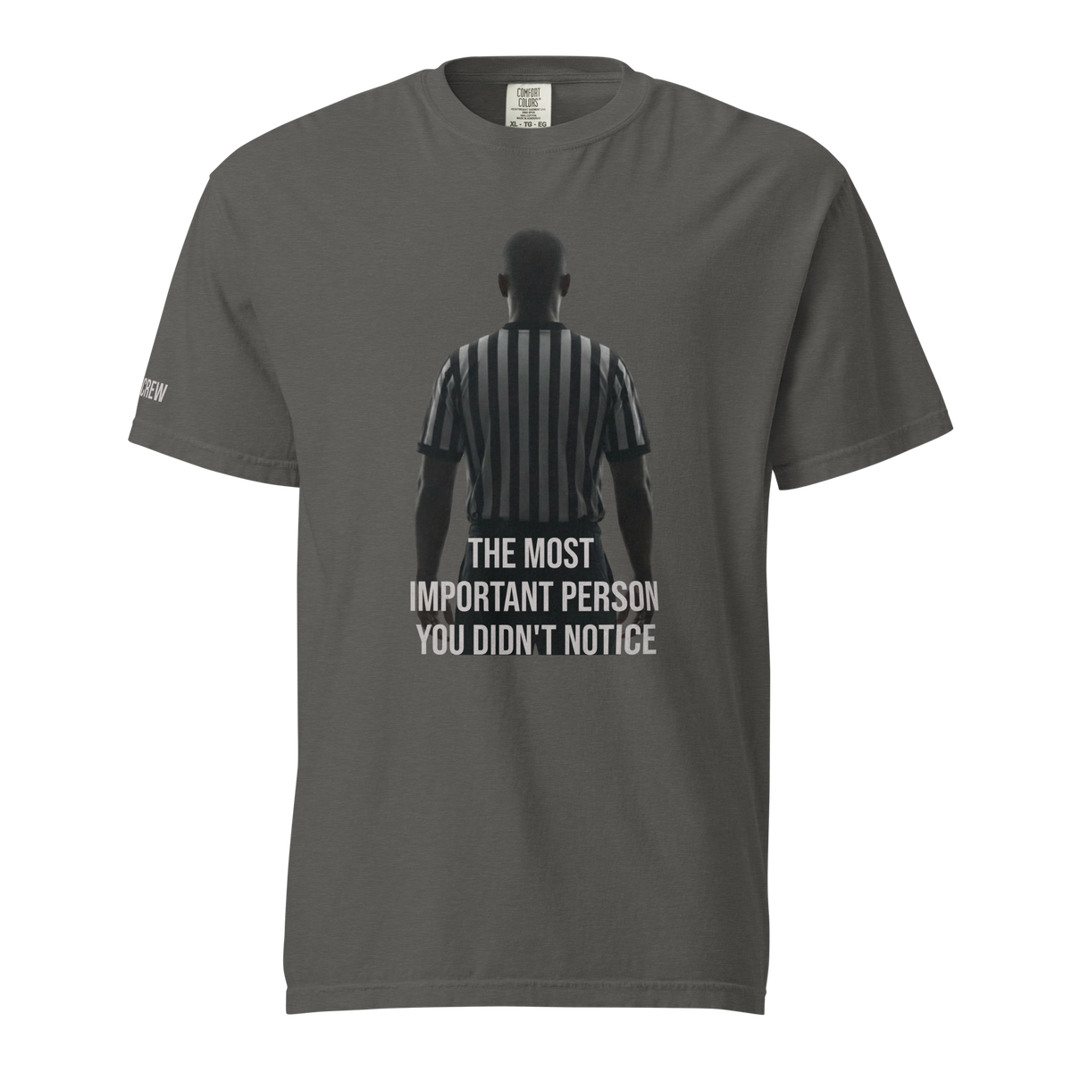 Ref' Crew "Unnoticed" referee t-shirt for basketball officials, dark gray, with a powerful graphic of a referee's back and text.