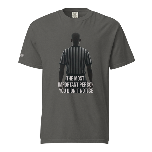 Ref' Crew "Unnoticed" referee t-shirt for basketball officials, dark gray, with a powerful graphic of a referee's back and text.