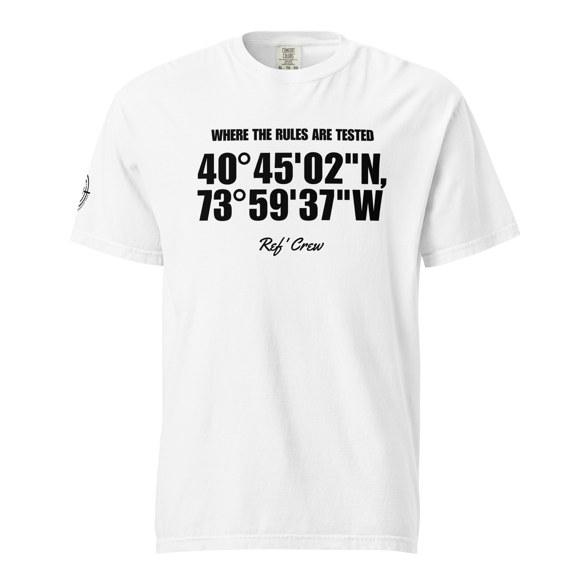 The Coordinates Tee in white — front view. Bold coordinates across the chest with "Where the rules are tested" above and the Ref' Crew signature below, on garment-dyed heavyweight cotton.