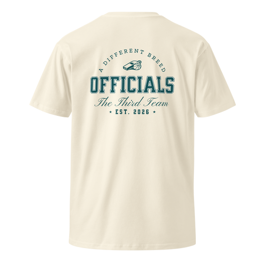 Cream AS Colour 5001 combed cotton tee with "Officials - The Third Team" graphic and whistle logo on back.