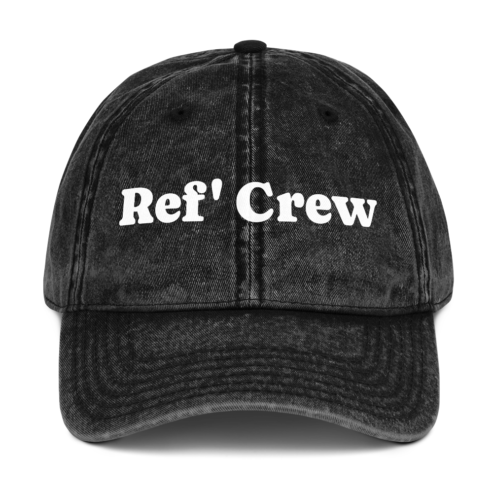 Washed black vintage dad cap with "Ref' Crew" in white groovy serif lettering, perfect for basketball officials.