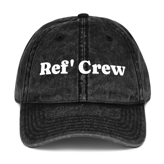 Washed black vintage dad cap with "Ref' Crew" in white groovy serif lettering, perfect for basketball officials.
