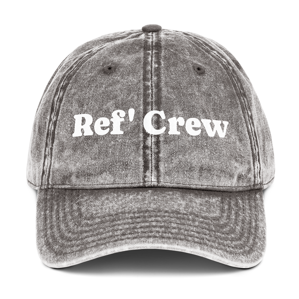 Charcoal gray washed cotton Ref' Crew dad cap with white groovy serif lettering, adjustable brass buckle.