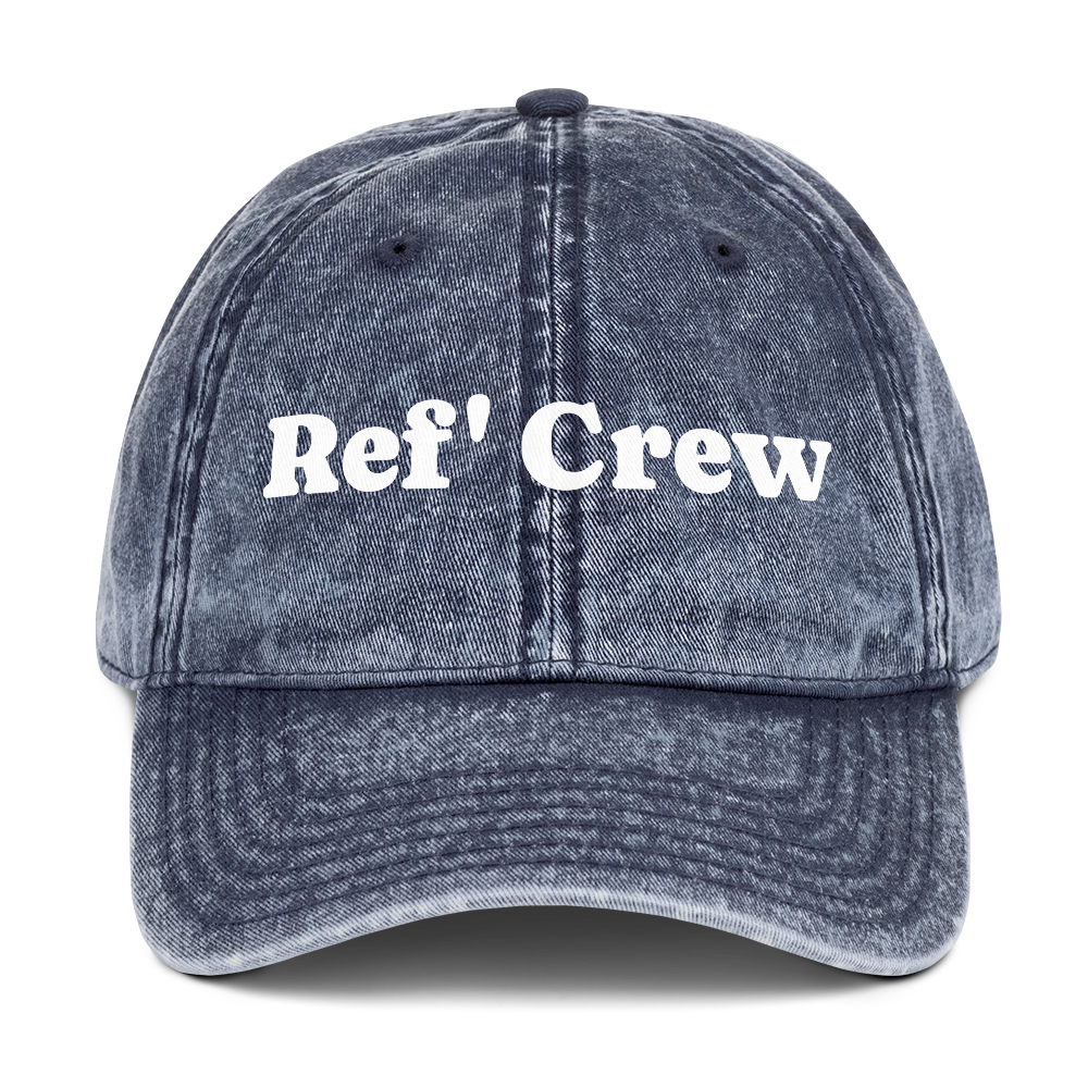 Washed navy cotton twill dad cap with "Ref' Crew" in white groovy serif text, perfect for basketball officials.